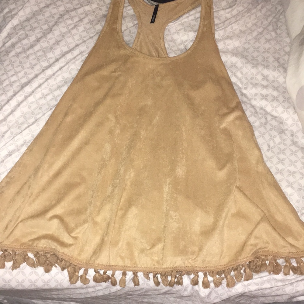 Caramel colored suede top with tassel detail